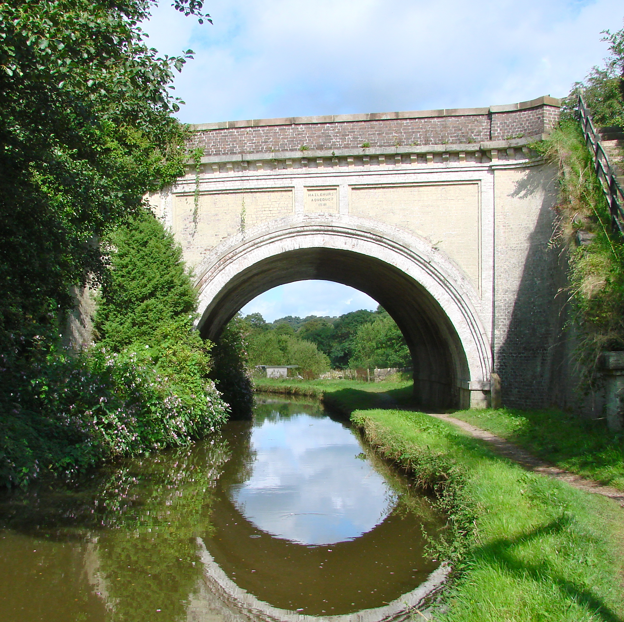 Carries Leek Branch over Caldon Canal painted brick. Caldon Canal